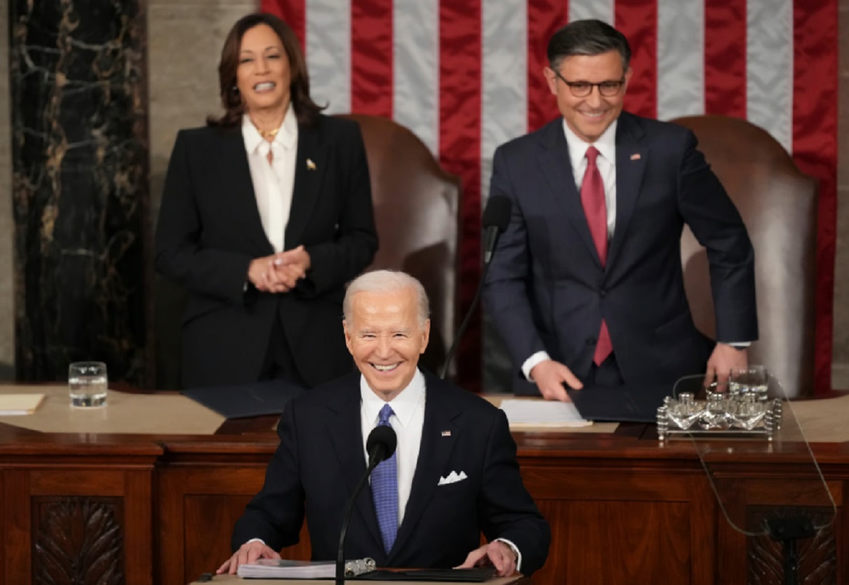 President Joe Biden delivers the State of the Union address to a joint session of Congress at the U.S. Capitol, Thursday March 7, 2024, in Washington, as Vice President Kamala Harris and House Speaker Mike Johnson of La., watch.