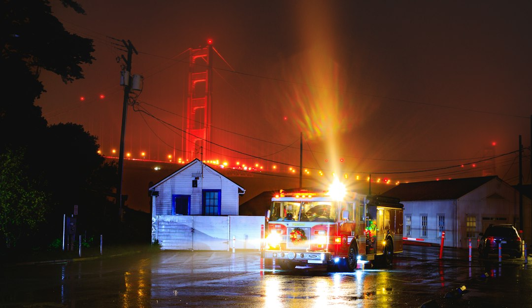 A fire truck responding to a call at night