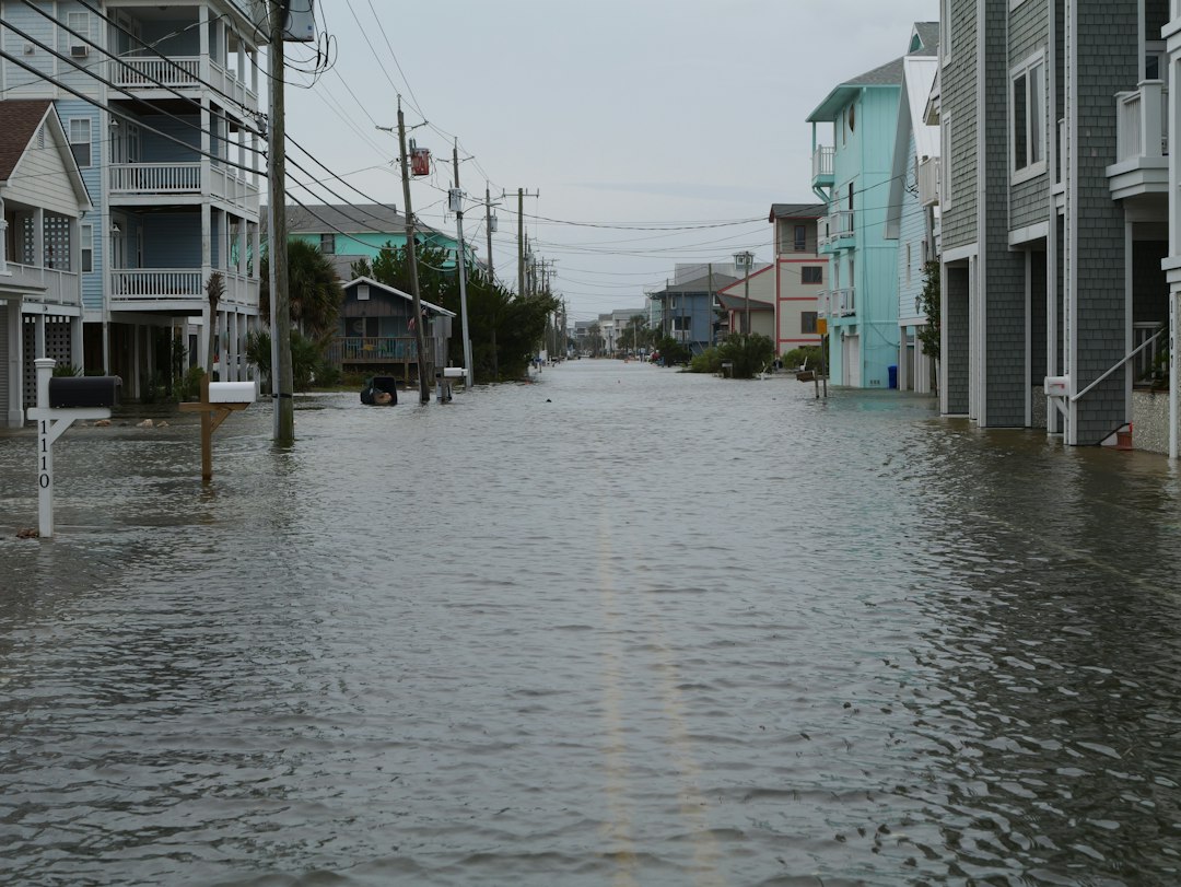A coastal street covered by floodwater